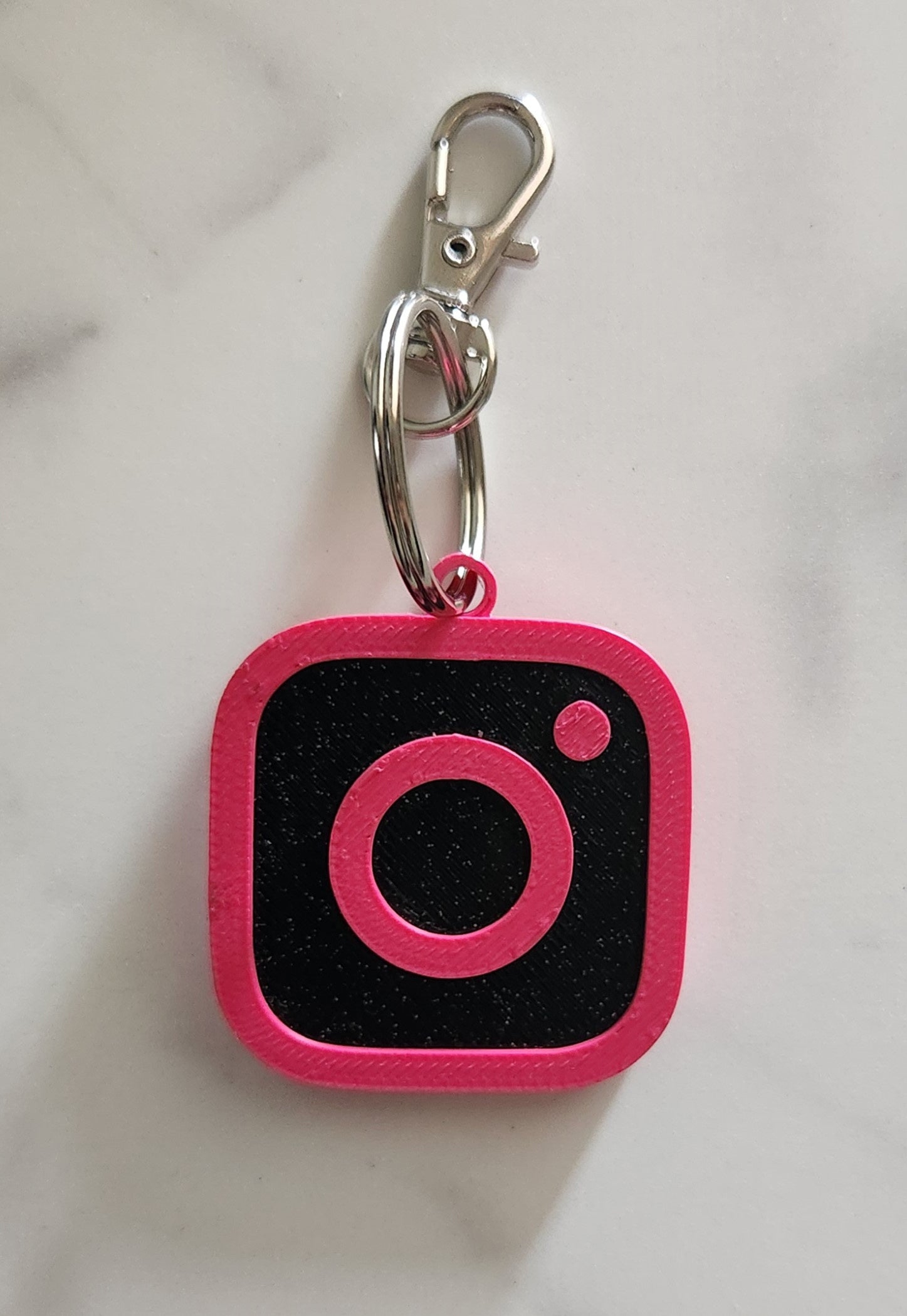 Bordered magenta & black glitter NFC tag for Instagram - stylish contact-sharing tag with a structured design.