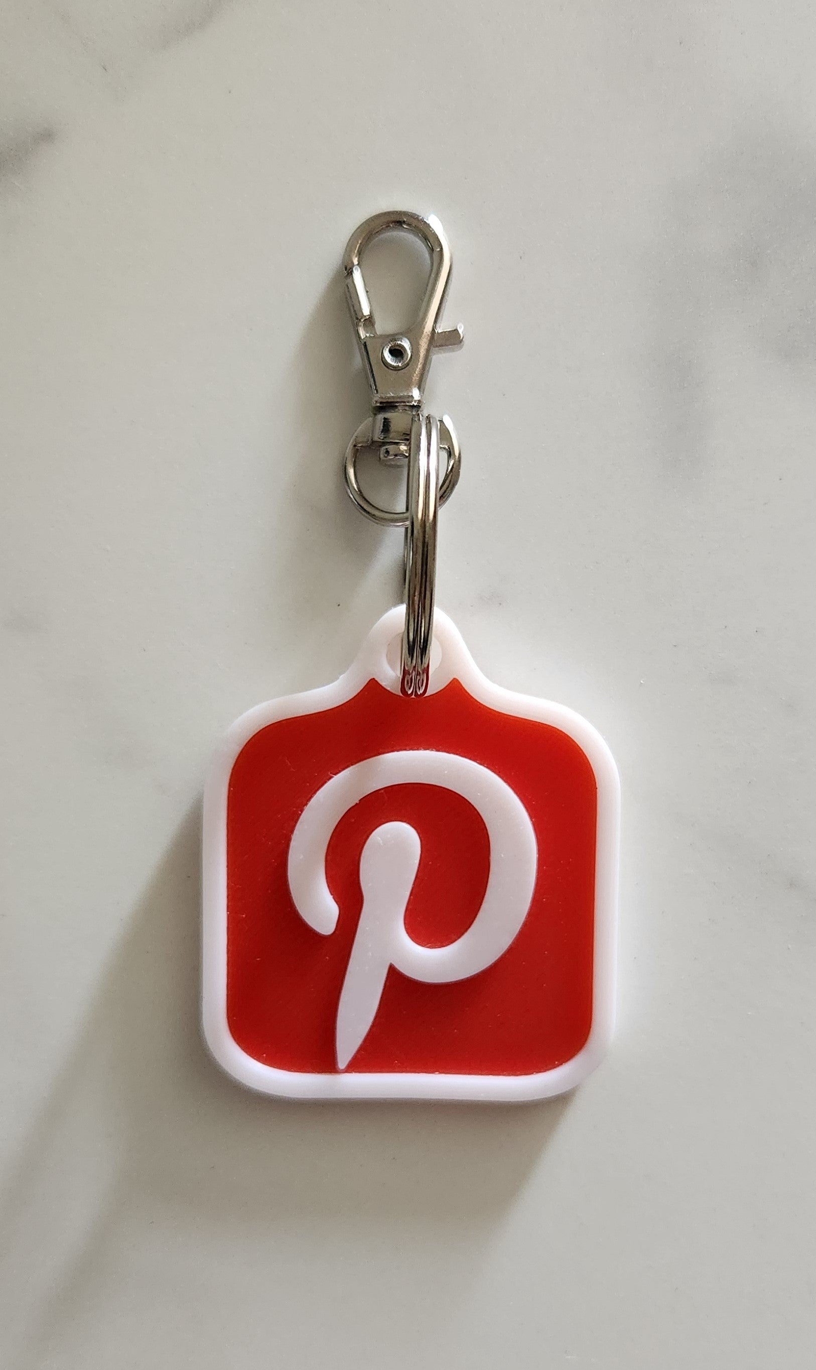 Outlined NFC tag for Pinterest - modern smart tag with a clean, bordered style.